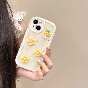 Detail of cream wavy iPhone case with glitter finish and cute 3D yellow flowers