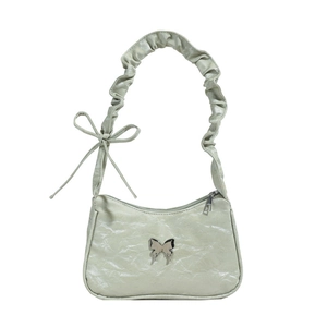Minimalist light green ruched hobo bag with silver butterfly and pleated shoulder strap