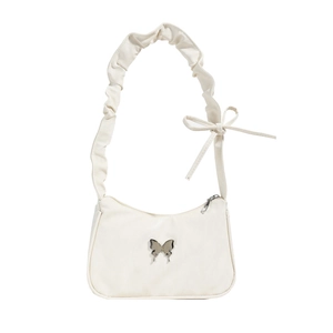 White minimalist faux leather shoulder bag with silver butterfly and scrunchie strap