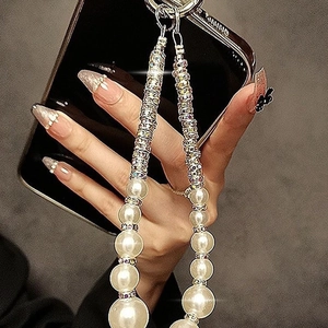 Lanière de téléphone en perles de luxe avec anneaux en strass et fermoir en argent