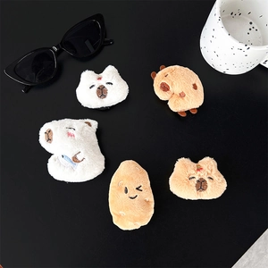 Close-up of five plush capybara and cat phone grips with soft fur and fine embroidery