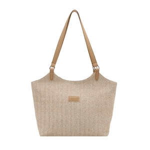 Minimalist beige woven straw tote bag with brown leather straps and fashion patch