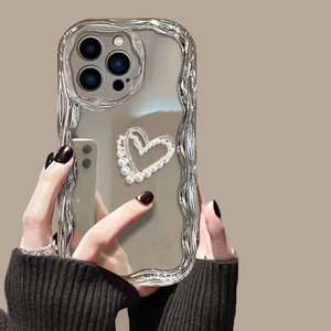 Silver plated mirror wavy case for iPhone featuring pearl and rhinestone heart decor