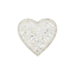 Sparkling heart-shaped phone grip with glitter center and rhinestone border on white background