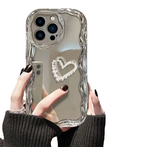 Silver mirror phone case for iPhone with wavy edges and pearl heart decoration