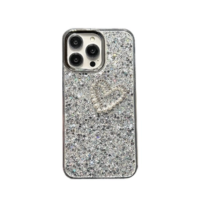Sparkling silver glitter iPhone case with pearl and rhinestone heart design on white background