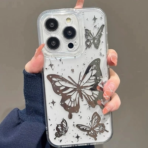 Handheld iPhone 16 Pro Max clear case featuring silver electroplated butterfly and glitter