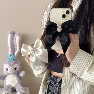 Rhinestone bow phone grip holder in black and beige satin with pink heart gem