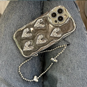 Electroplated heart phone case with wavy edges and beaded heart strap for iPhone