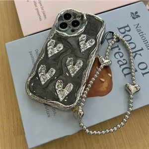 Electroplated heart phone case with silver wrinkled border and matching beaded strap
