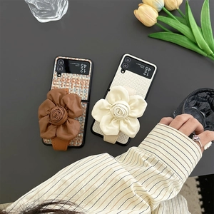 Floral strap tweed case for Samsung Z Flip 5 with elegant foldable leather design