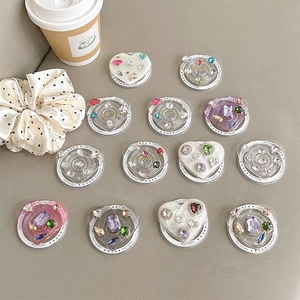 Colorful gemstone heart phone grip sockets with MagSafe support in various colors