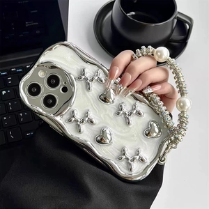 Plated heart puppy iPhone case with white marble texture and pearl wrist strap