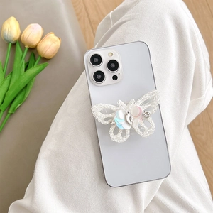 Chic beaded butterfly phone grip with iridescent sequins on a white smartphone