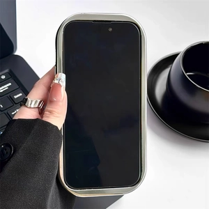 Macro view of silver chrome heart dog phone case for iPhone with stylish metal hand chain