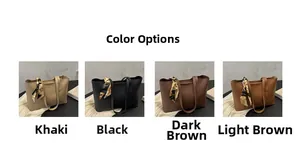 Detail view of large tote bags in khaki, black and brown with decorative scarves