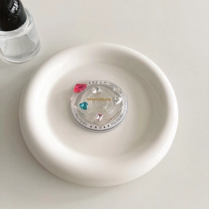 Detail of heart phone grip with colorful crystals and gold 'when I met you' text