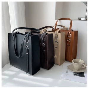 Showcase of minimalist PU leather tote bags in black, coffee, beige, and caramel colors
