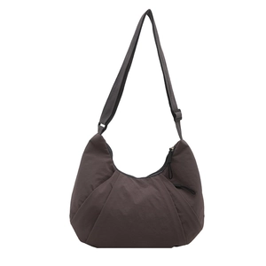 Minimalist coffee brown crescent crossbody bag with pleated nylon fabric and wide strap
