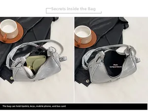 Detail view of the spacious light gray bow bag interior with daily essentials storage