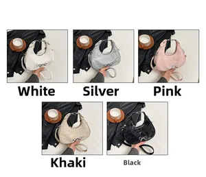 Detailed comparison of the bow crescent bag in white, silver, pink, khaki and black colors
