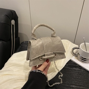 Elegant metallic texture mini handbag with thick handle and golden chain shoulder strap