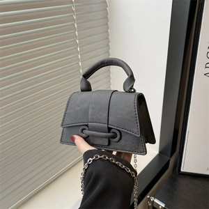 Deep grey minimalist mini handbag with silver metal chain strap and top handle