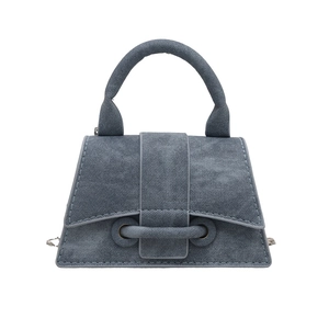 French style denim blue trapezoid handbag with top handle and metal chain strap