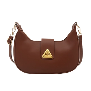 Brown half-moon hobo bag with a gold triangle clasp and adjustable shoulder strap