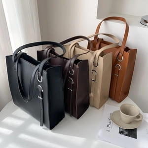 Minimalist large PU leather tote bag in four neutral colors with adjustable straps