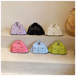 Detail of creative jacket-style mini crossbody bags in six vibrant colors with chain straps