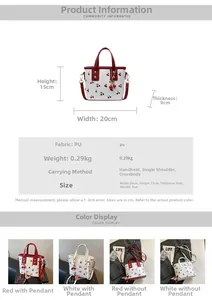 Detailed view of cherry print tote bag showing 20x15x9cm dimensions and white PU material
