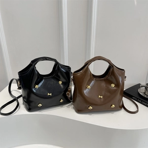 Fashionable shiny PU leather bucket bag with gold dog studs in black and brown colors