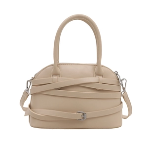 Minimalist beige handbag with cross-strap design and silver metal buckle on white background