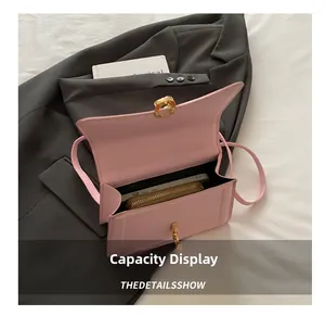 Pink shoulder bag interior view showing large capacity for phone and long wallet