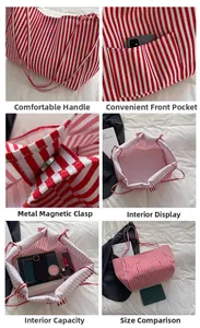 Detail of red and white striped tote bag showing magnetic buckle and spacious interior