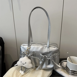 Silver metallic large capacity shoulder bag with bow pockets and plush charm charm