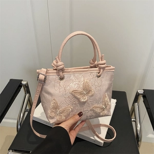 Pink Chinese style bucket bag with butterfly embroidery and adjustable shoulder strap