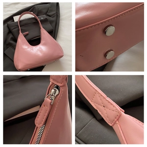 Detailed views of pink glossy hobo bag with silver zipper and metal bottom studs