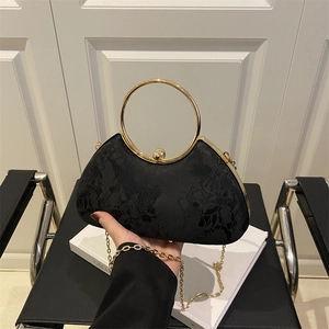 Elegant black evening clutch with rose embroidery, golden metal handle and chain strap