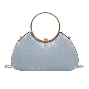 Elegant light blue embroidered floral handbag with gold ring handle and chain strap