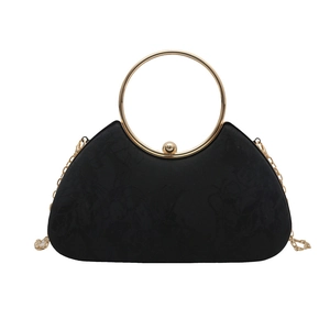 Elegant black clutch bag with gold round handle and floral texture for evening party