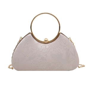 Elegant beige floral embroidered clutch bag with a round metal handle and gold chain strap