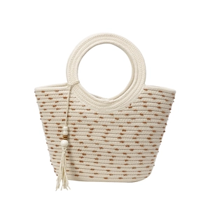 Minimalist woven cotton rope tote bag with brown polka dots and fringe tassel detail
