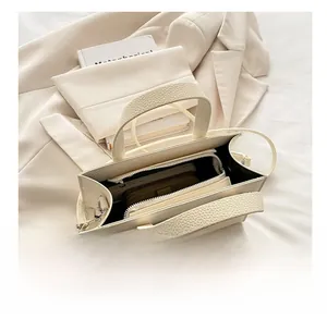 Internal capacity of cream lychee texture leather tote showing compartments and storage space