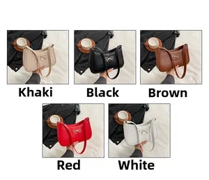 Detail view of five colors for crocodile pattern bow handbags in khaki black brown red white