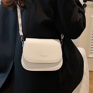 White semi-circular crossbody bag in PU leather with Fashion Trend EST 1996 text