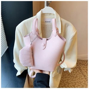 Pink lychee grain leather bucket bag with chain coin purse and adjustable strap