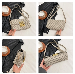 Detail view of vintage printed square bag featuring golden lock and four-angle perspectives