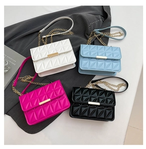 Quilted crossbody bags in four colors with triangle patterns and gold metal locks